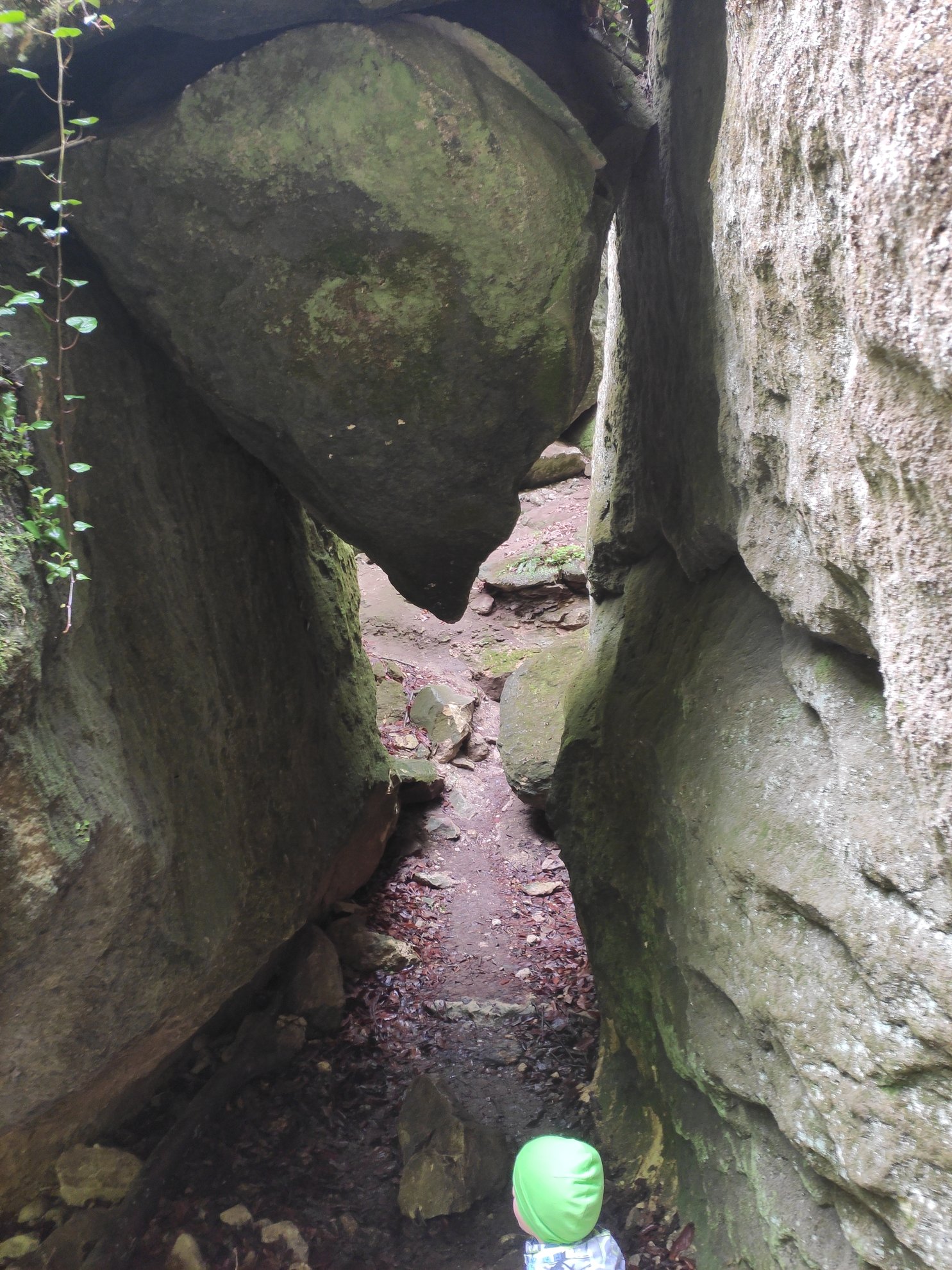 narrow path between large boulders