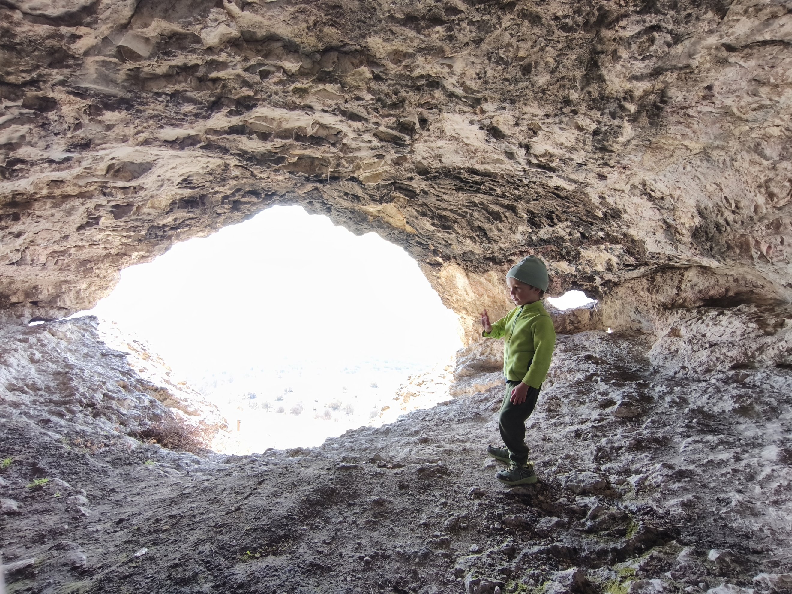 interior view of a cave looking toward the opening