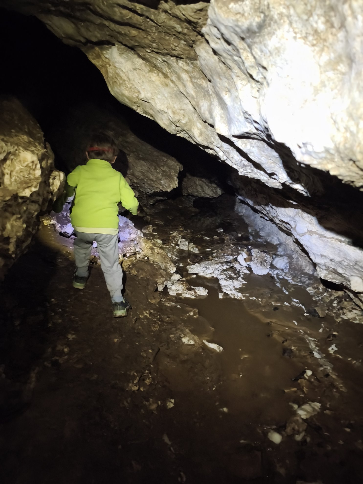 low ceiling and rocky floor inside the cave