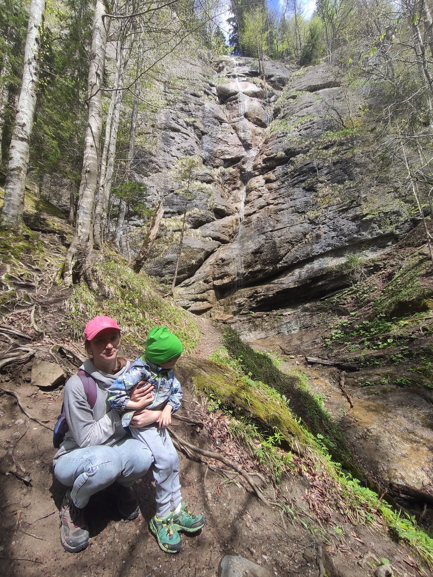 low angle view of the rock face and waterfall